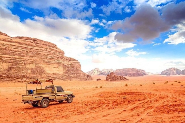 Tour naar Wadi Rum vanuit Amman of de hele dag over de Dode ZeeTour naar Wadi Rum vanuit Amman of DeadSea Minivan van een hele dag 7pax