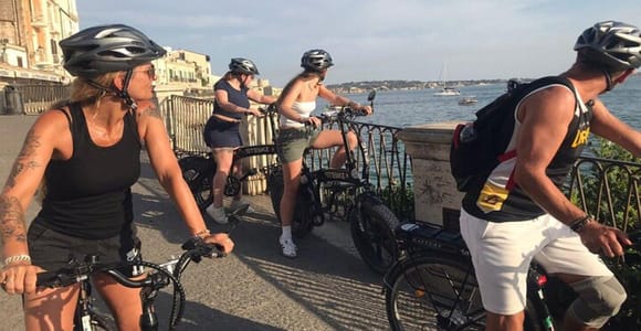 Ortigia by E-Bike at Sunset with an Aperitif Overlooking the Sea