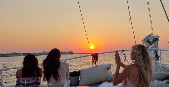 Rhodes: Sunset Cruise with Open Bar, Dinner, & Live Music