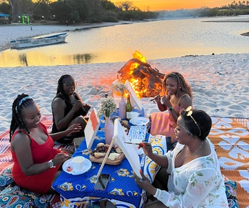 DIANI: A ROMANTIC BEACH BONFIRE DINNER SET UP