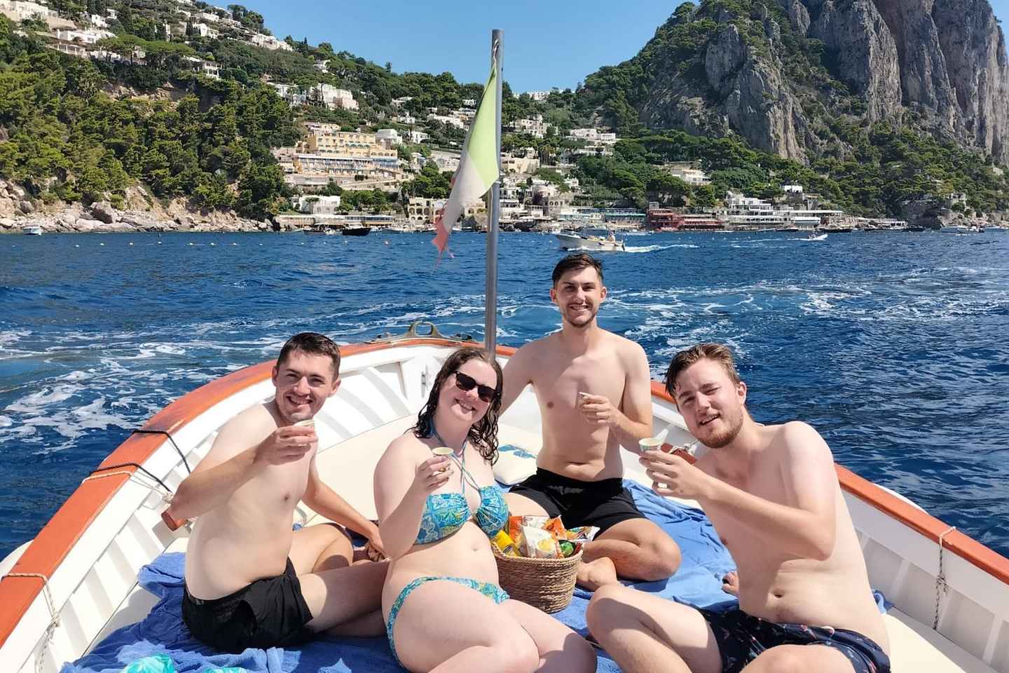 Capri: Scenic Boat Tour with Swimming, Limoncello & Snack