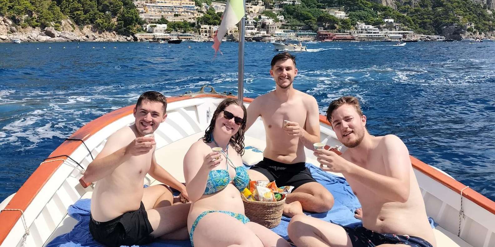 Capri Boat Experience: Faraglioni, Caves, Swim, Limoncello — image 4