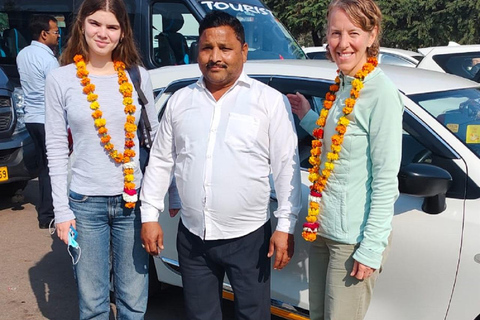 From Delhi: Sunrise Taj Mahal & Agra Fort Day Trip by AC Car Tour Guide Services Only