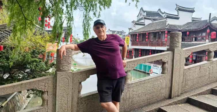 Ancient Water Town + Yu Garden + Bund by Bike/Escooter photo 4