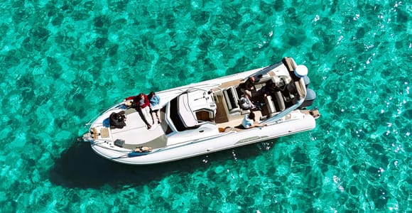 Egadi Islands tour by bus and inflatable boat with aperitif on board