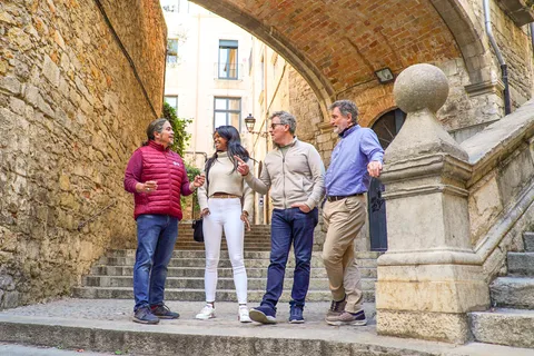 From Barcelona: Girona, Calella & Medieval Village Day Trip