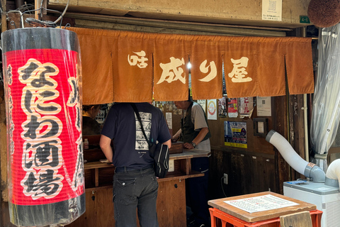 Osaka: Wycieczka kulinarna Retro Shinsekai z lokalnymi potrawami ulicznymiOsaka: Wycieczka kulinarna w Shinsekai, 3 godziny (jedzenie wliczone w cenę)