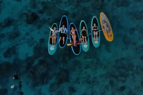 gili sunrise Stand-up paddle boarding or kayaking (droneshot