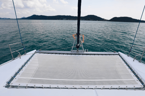 Phuket Catamaran Tour in Coral Island and Sunset Voyage