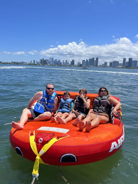 Miami Day Boat Party with Jet Skis Drinks Music Tubing