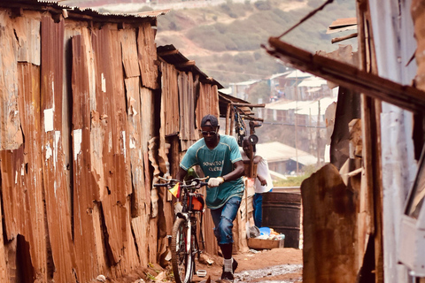 Visit a local Bar, Seeing the overview of the slum, Walking.