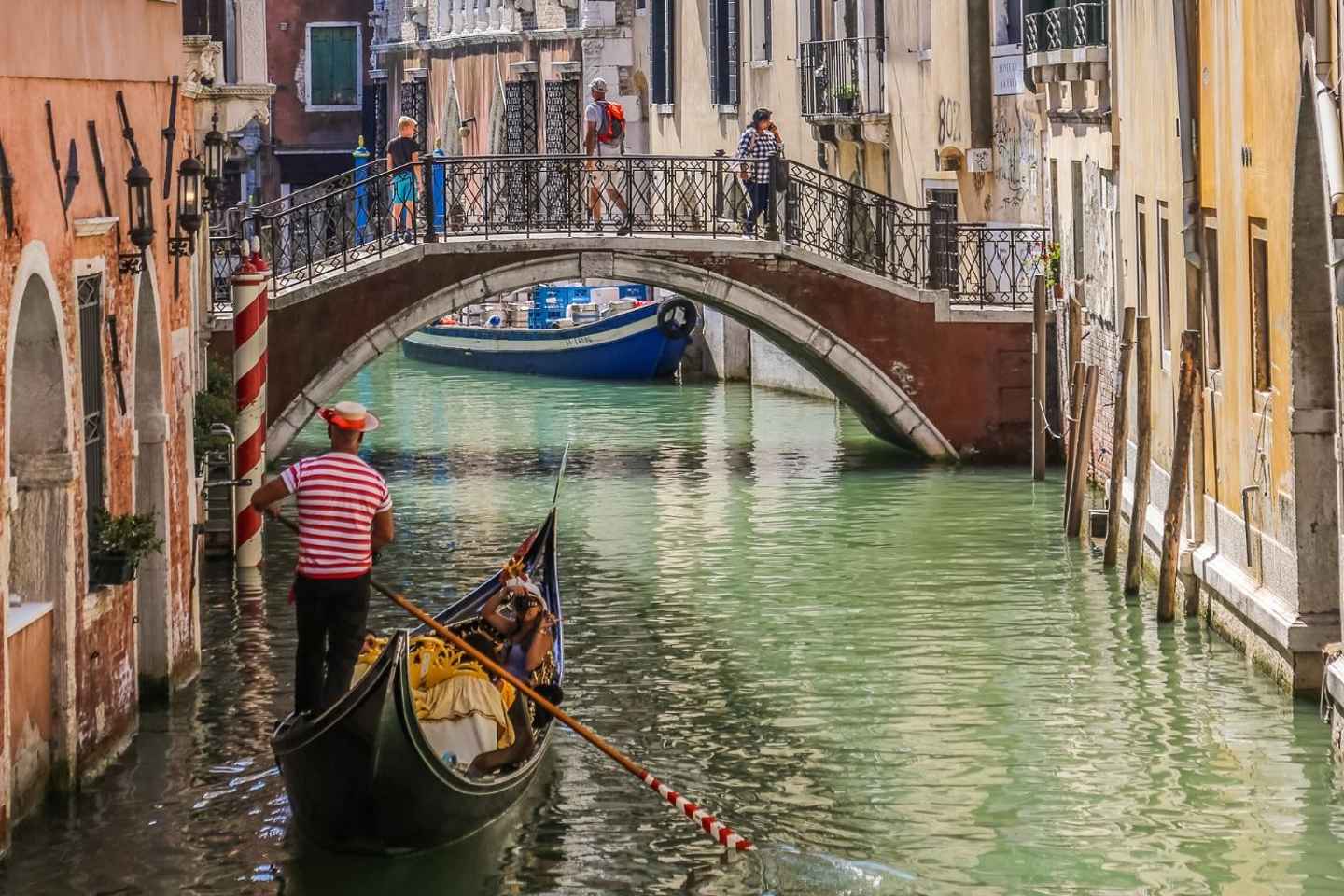 Venice: Crafted Gondola Under Breathtaking Bridge of Sighs
