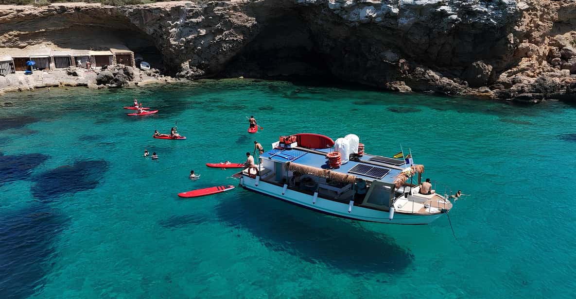 Ibiza by Sea: Coves, Caves, Water Sports & Open Bar — a boat tour from Ibiza, Spain