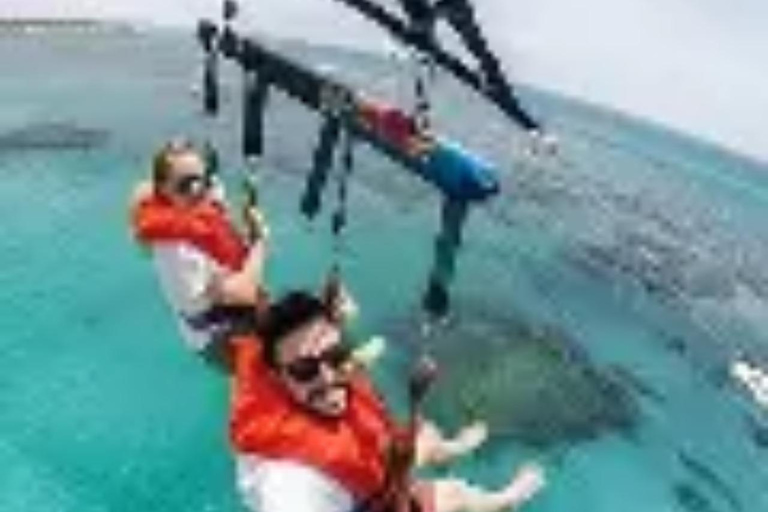 Muscat: Parasailing Adventure over the Sea of Oman Muscat: Parasailing Adventure From Marina Bandar Al Rowdha