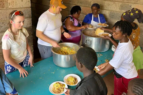 Cidade de Arusha: Visita a lares de crianças e turnê de doações.