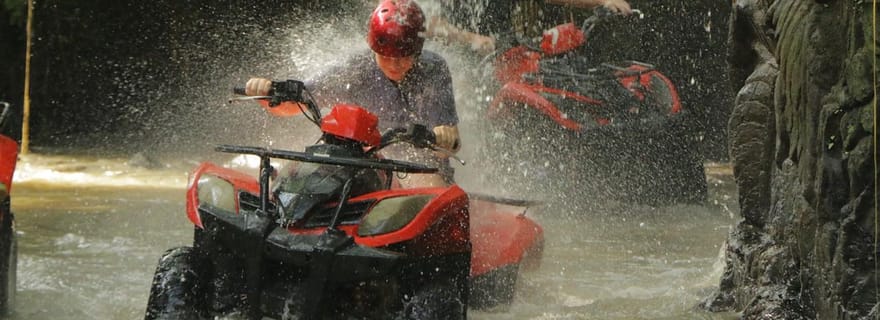 Balade en quad à Ubud à travers les tunnels, les rizières et les flaques d'eau