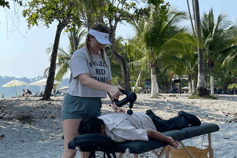 Percussive Massage Therapy + Assisted Stretching on beach