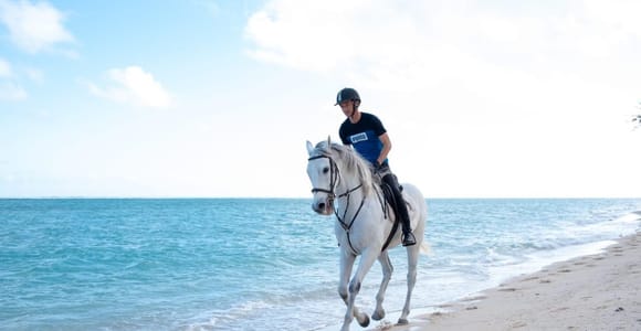 Mauritius: Horse riding on the deserted beach of Riambel
