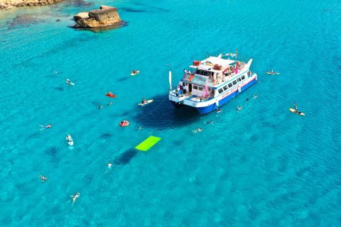 Ibiza: strandhoppen per boot + paddleboard, snacks & drank