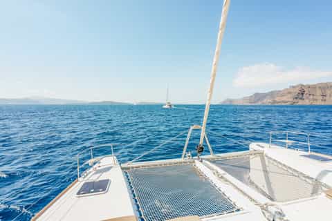 Santorini: Luxury Small Group Catamaran w/ Meal & Open Bar