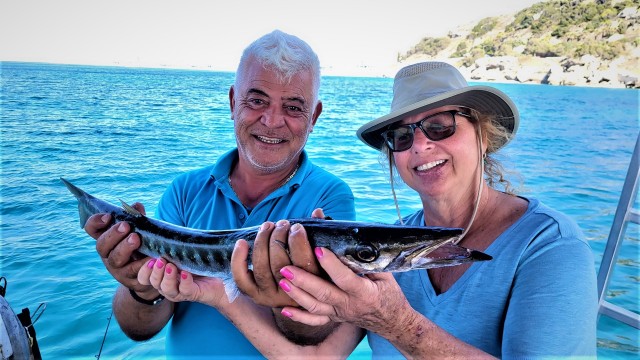 Visit Rhodes Fishing Trip, Snorkelling, BBQ, & Professional Guide in Rhodes