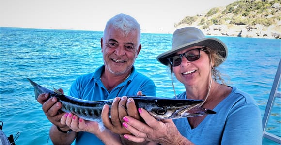 Rhodes: Fishing Trip, Snorkelling, BBQ, & Professional Guide