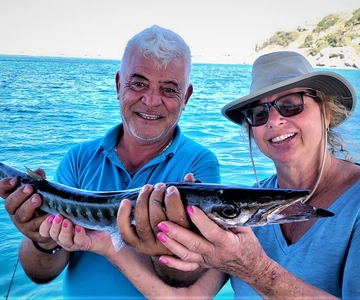 Rhodes: Fishing Trip, Snorkelling, BBQ, & Professional Guide