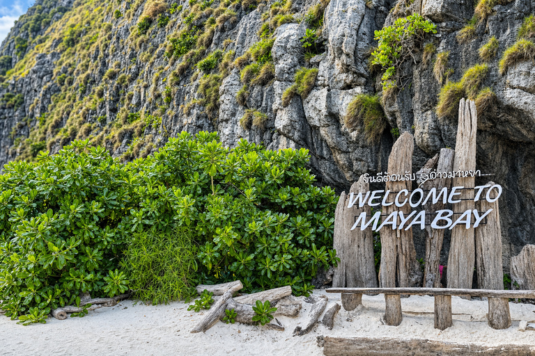 From Phi Phi: Iconic Bays by Longtail—Beach, Lagoon, Snorkel Phi Phi: Longtail Join Trip — Bays, Beach & Snorkeling