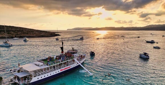 Blue Lagoon Sunset Cruise | Swim, Snorkel & Slide Experience