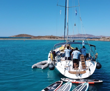 Mykonos: Delos and Rhenia Cruise with Swim and Greek Meal