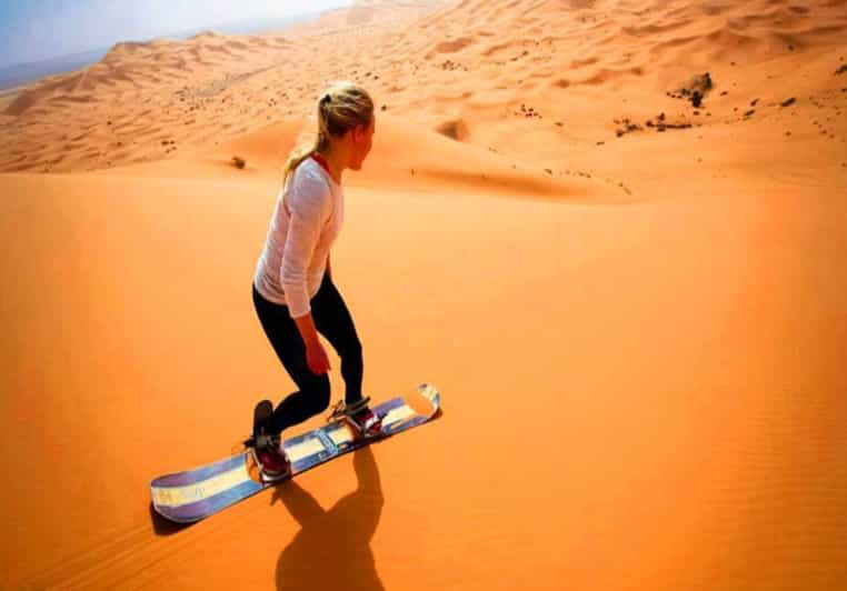 Desert Safaris Dubai, Dinner, Shows, Camel Ride & Sandboard | GetYourGuide