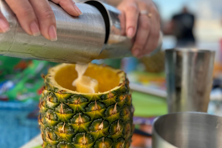 Make Piña Colada in a private rooftop in "La Perla"