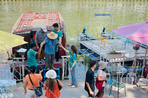 1 hour Nhieu Loc boat tour experience: A Glimpse of Saigon Releasing Fish