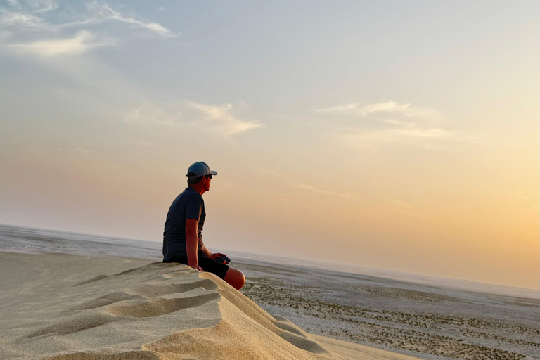 Doha: inland sea Tour With Dune Bashing &Sandboarding fun Doha: safari , camel ride, sandboarding hotel pickup