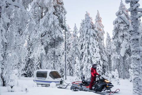 Rovaniemi: Family snowmobile safari with heated sleigh