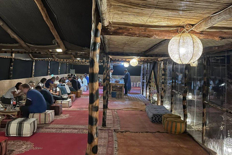 Cena magica e giro in cammello nel deserto di AgafaySpettacolo con cena magica e giro in cammello nel deserto di Agafay