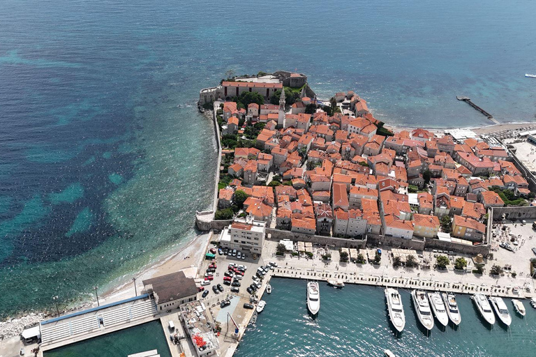 Podgorica Airport to Budva Scenic Drive with Female Driver