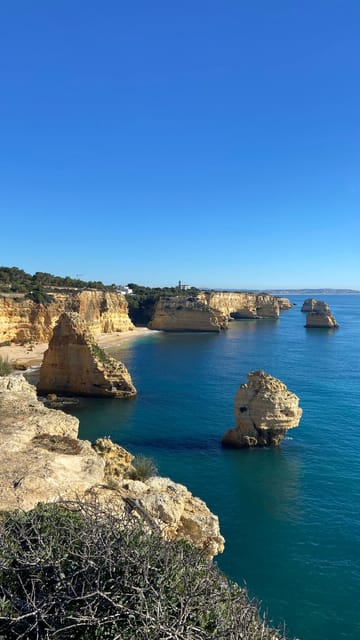 From Faro: Guided Caves, Beaches, Swimming & Hiking Day Tour | GetYourGuide