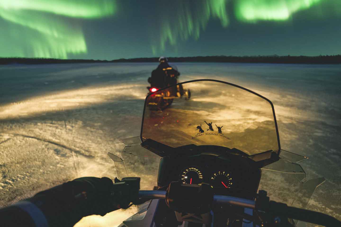 Caccia all'Aurora Boreale in Motoslitta a Rovaniemi