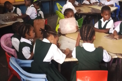 Zanzibar: Stone Town Tour and School Visit with Hassan Discover Town and School Visit with Hassan