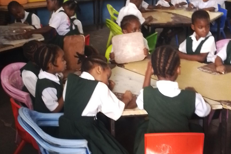 Zanzibar: Stone Town Tour and School Visit with Hassan Discover Town and School Visit with Hassan