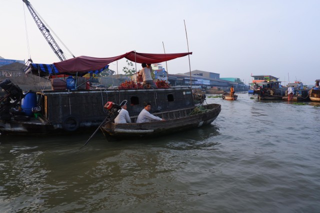 Visit Tour Cai rang floating market and biking in the rural in Can Tho, Vietnam