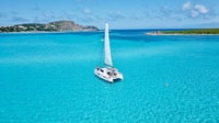 Tour Tourn, meio dia de catamarã para La Pelosa com Aperitif - Housity