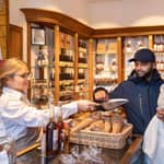 Gouda: Biglietto della fabbrica di cialde allo sciroppo con un waffle