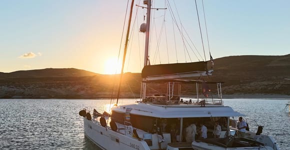 Mykonos: Sunset Cruise with Sailing Demo & Welcome Prosecco