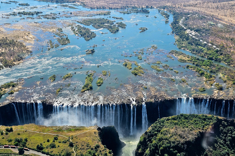 Tagestour: Victoria Falls Tour, Mittagessen & Luxus-Sonnenuntergangs-KreuzfahrtTagesausflug: Victoria Falls Tour, Mittagessen & Sunset Cruise