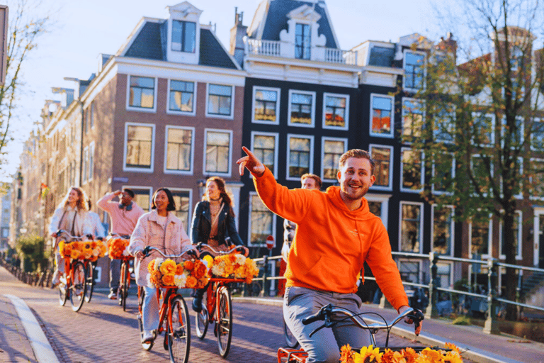 Amsterdam: Top Highlights Guided Bike Tour EN/DE/ES/FR/IT/CN Bike Tour with Guide & Audio Guide in DE, ES, FR, IT, and CN