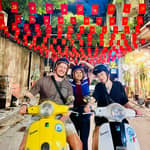Tour di Hanoi in Vespa dopo il tramonto con street food e atmosfera notturna