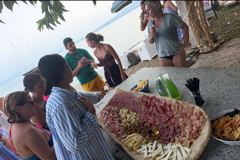 Golfo Aranci: transparent or traditional kayak, dolphins, and aperitif Sunset Tour in a Traditional Kayak with Aperitivo and Dolphins