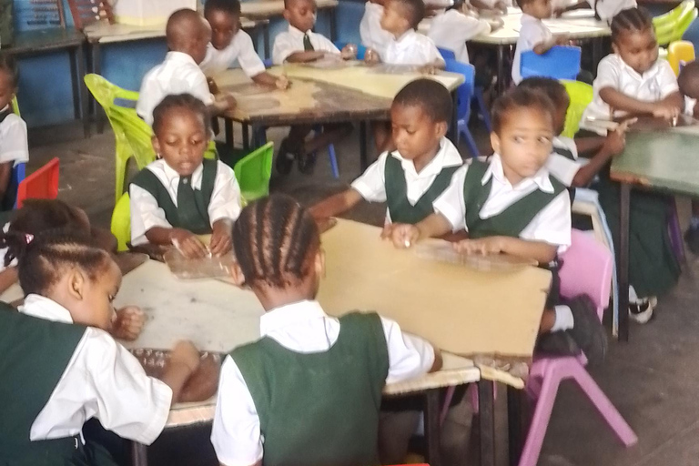 Zanzibar: Stone Town Tour and School Visit with Hassan Discover Town and School Visit with Hassan